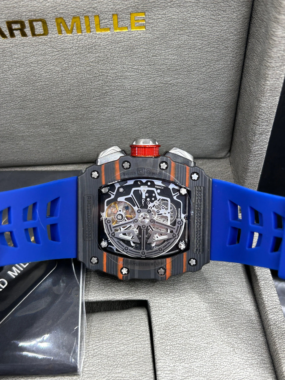 Montre squelette boîtier gris et bracelet bleu
