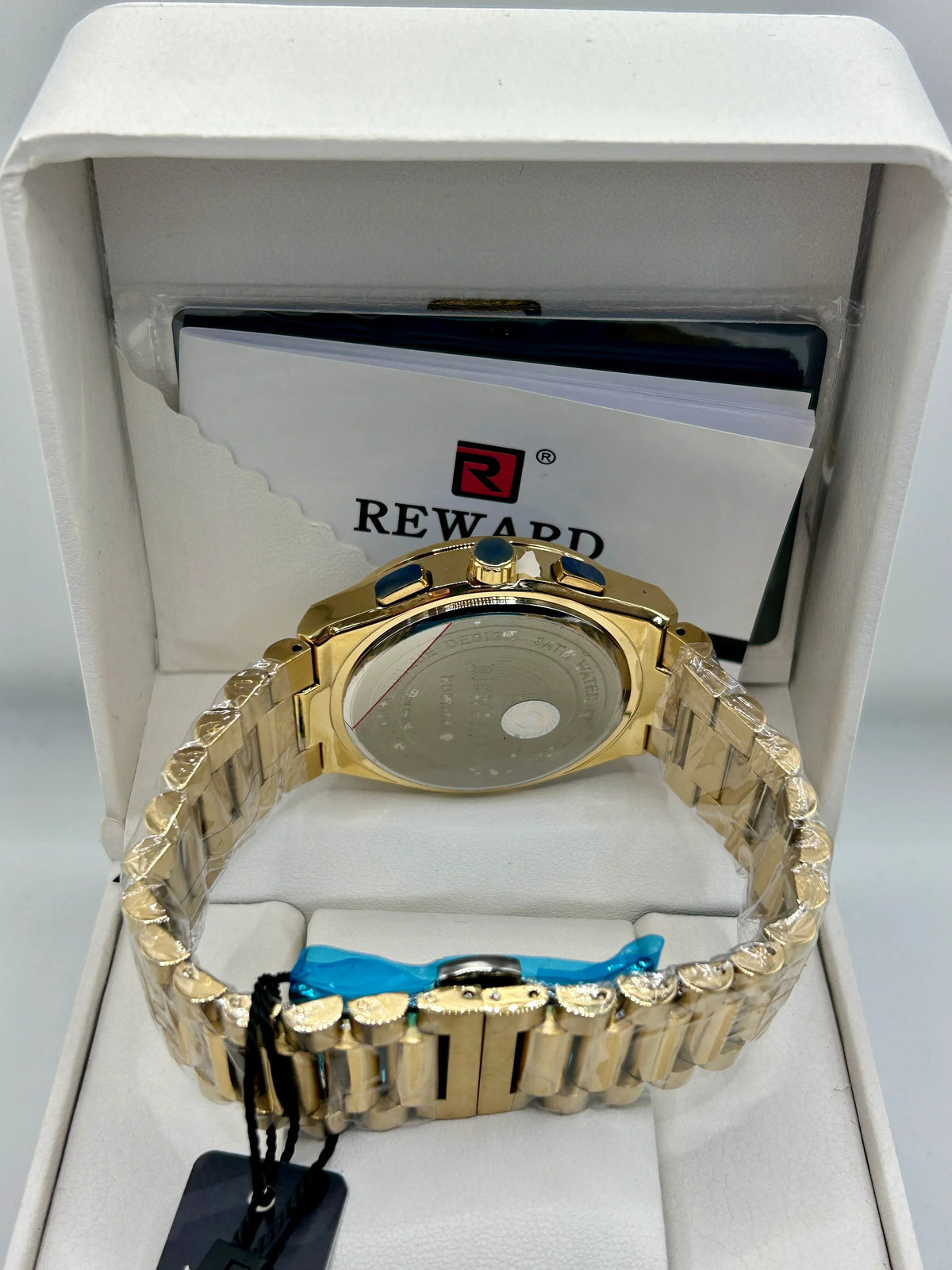 Montre chronographe quartz dorée à cadran bleu