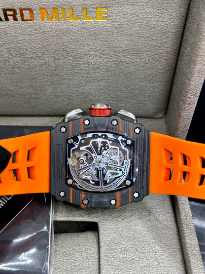 Montre squelette avec boîtier gris et bracelet orange