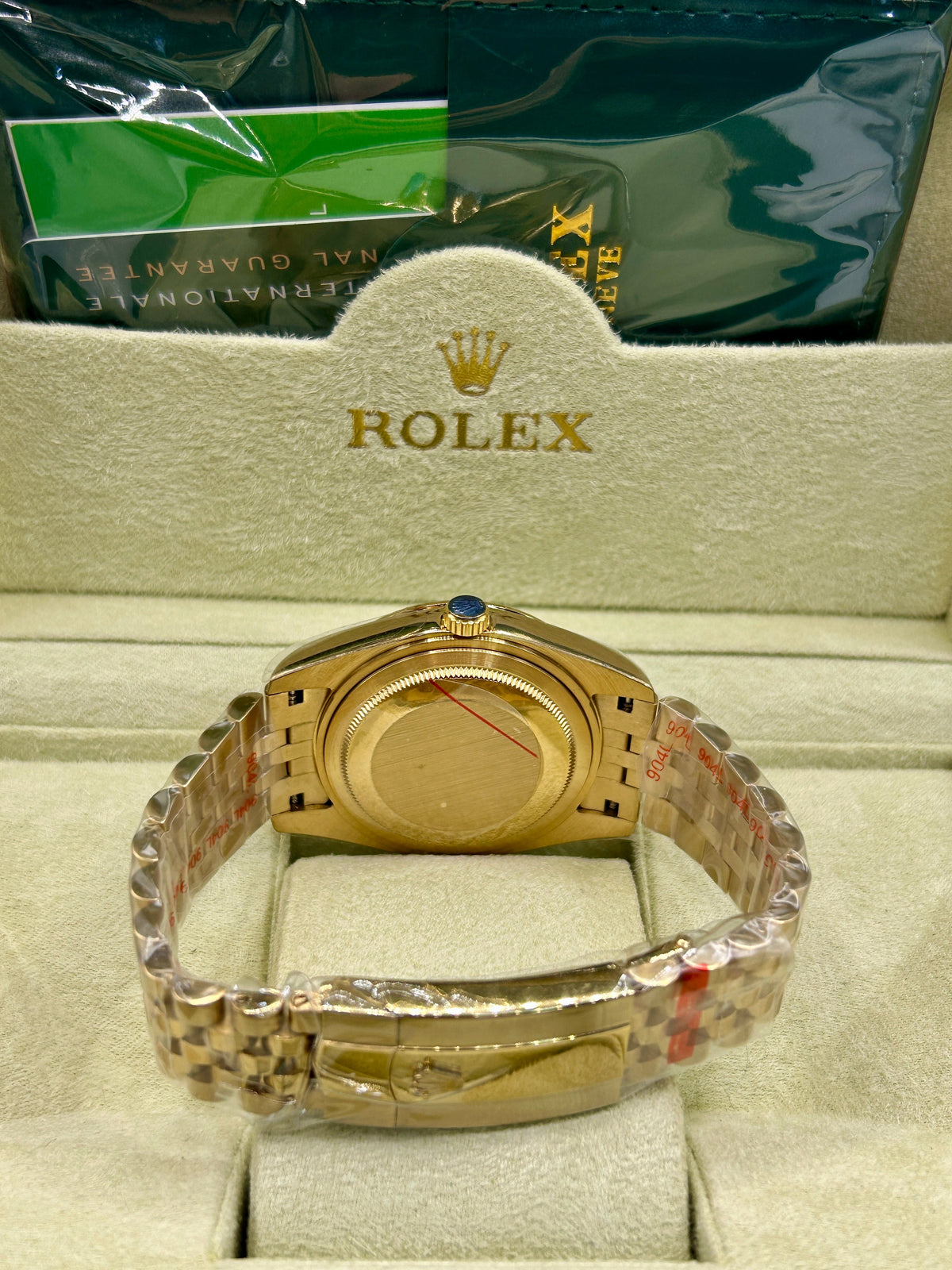 Montre Datejust en or rose avec cadran vert