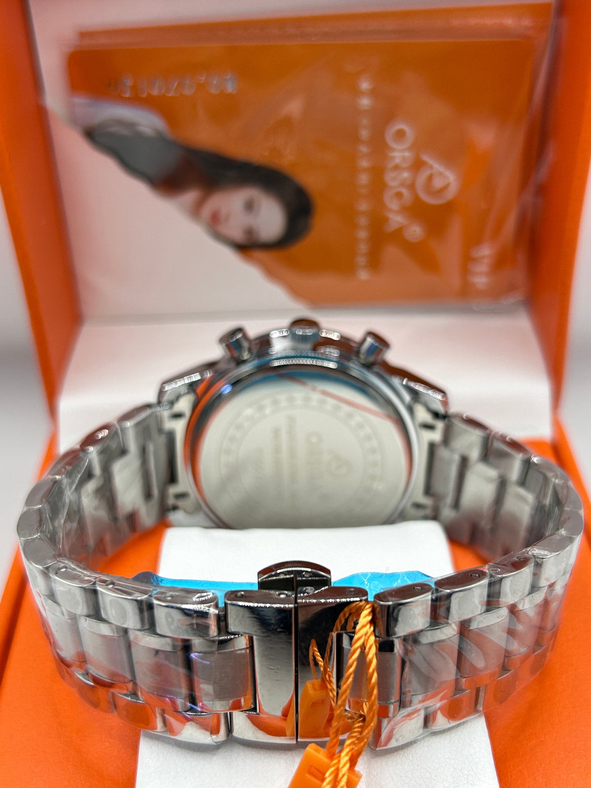Montre chronographe de luxe à cadran blanc et bracelet en acier inoxydable