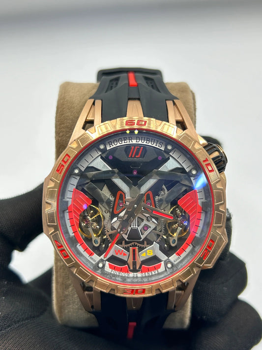 Montre chronographe or rose et rouge
