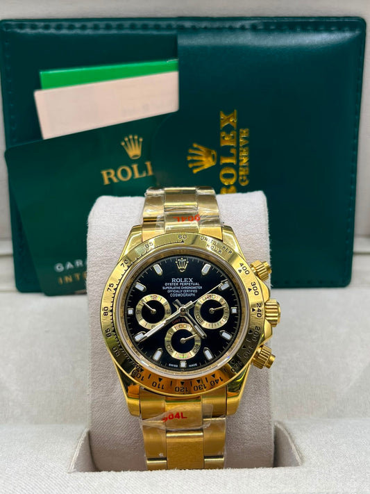 Montre chronographe à cadran noir en or jaune